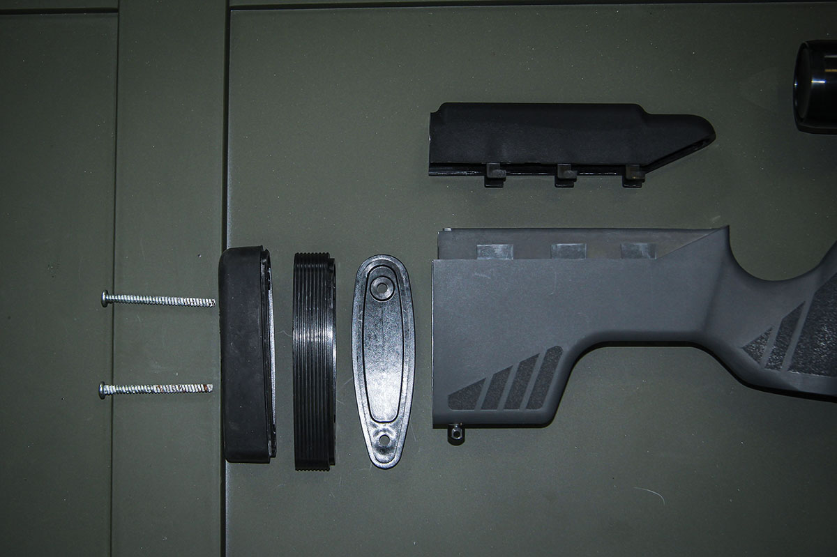 A blow-up of the parts of the buttstock length of pull adjustments. Two Phillip-head screws must be removed to change the length-of-pull and comb-height options.